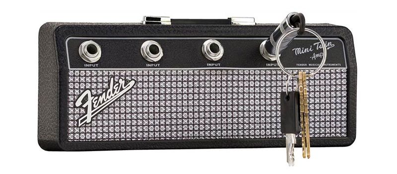 Fender  jack rack, including 4 Fender guitar plug keychains